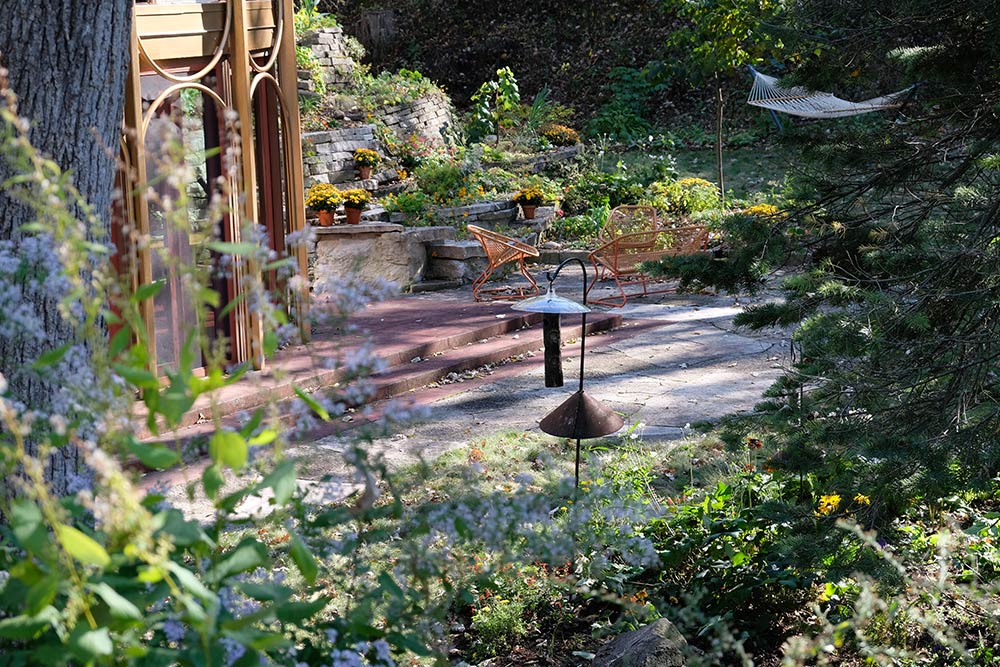 Quarry Project: Residential landscape project with birdfeeder and patio seating